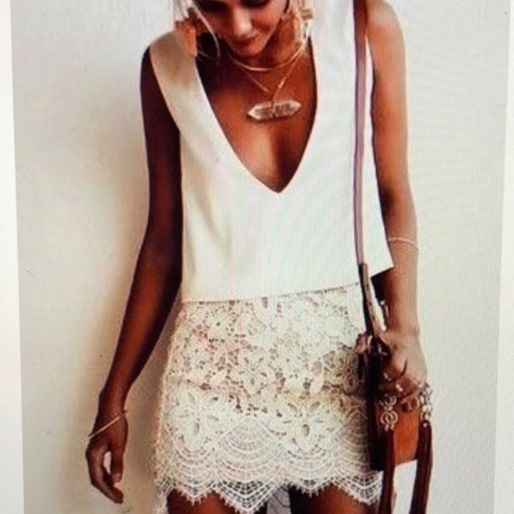 Cream colored lace mini skirt